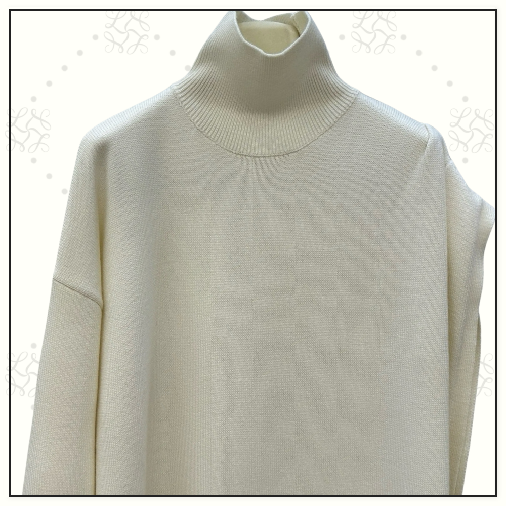 ASYMMETRIC CAPE WOOL SWEATER