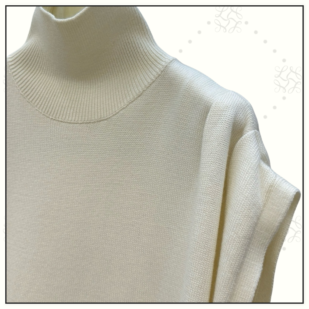 ASYMMETRIC CAPE WOOL SWEATER