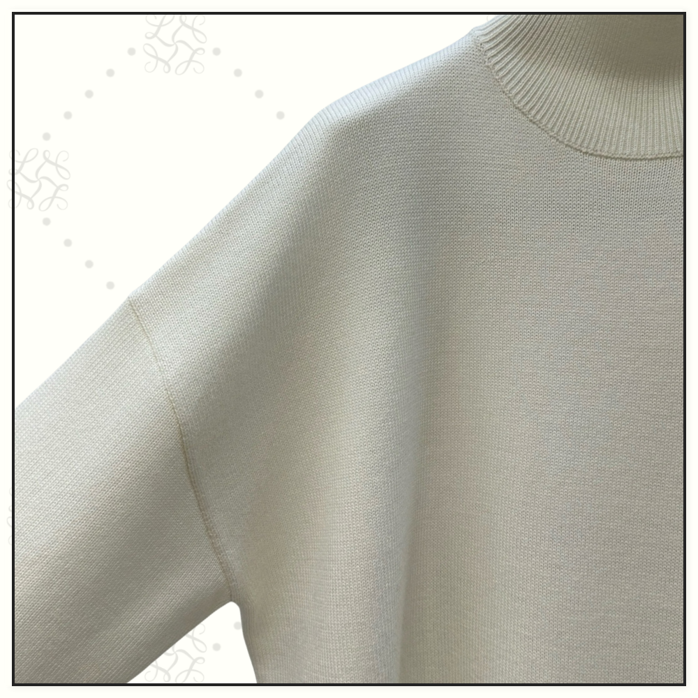 ASYMMETRIC CAPE WOOL SWEATER