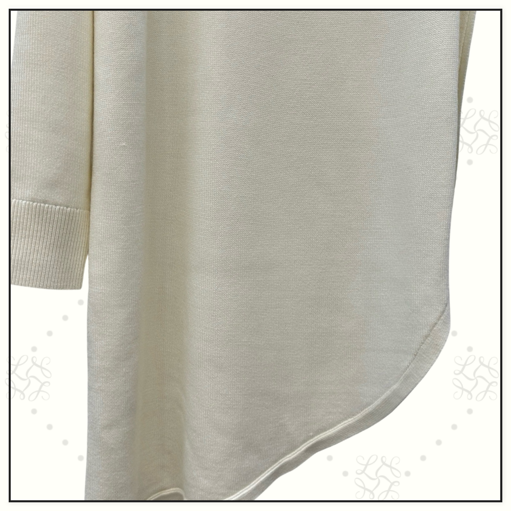 ASYMMETRIC CAPE WOOL SWEATER