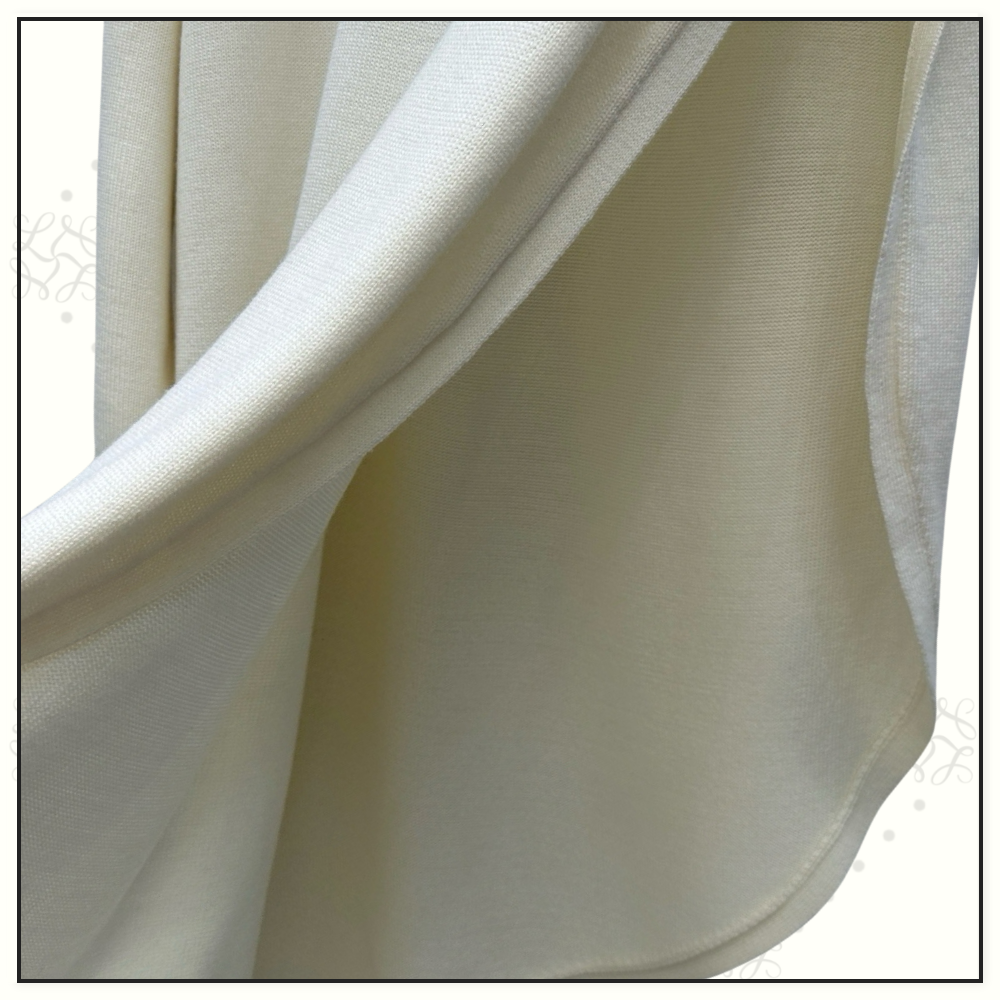 ASYMMETRIC CAPE WOOL SWEATER