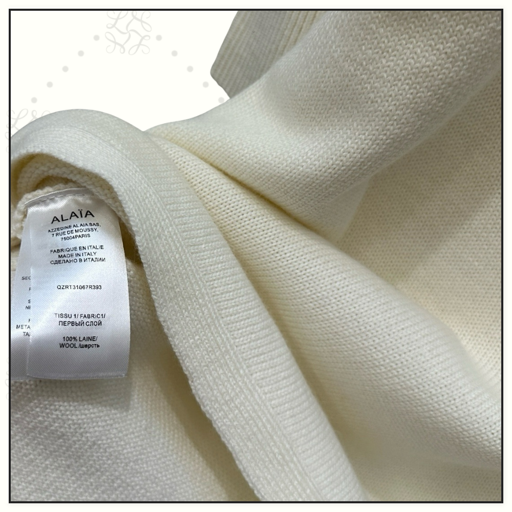 ASYMMETRIC CAPE WOOL SWEATER