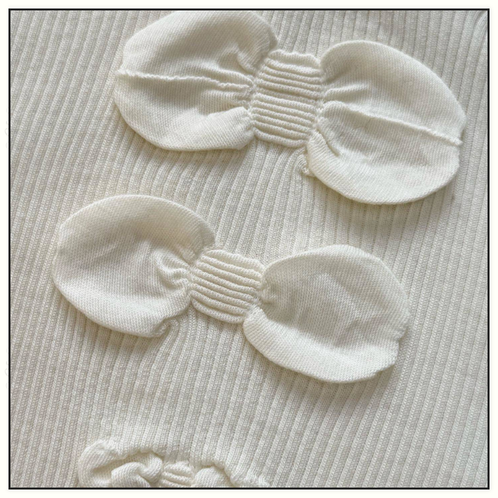 BOW DETAIL WOOL TURTLENECK