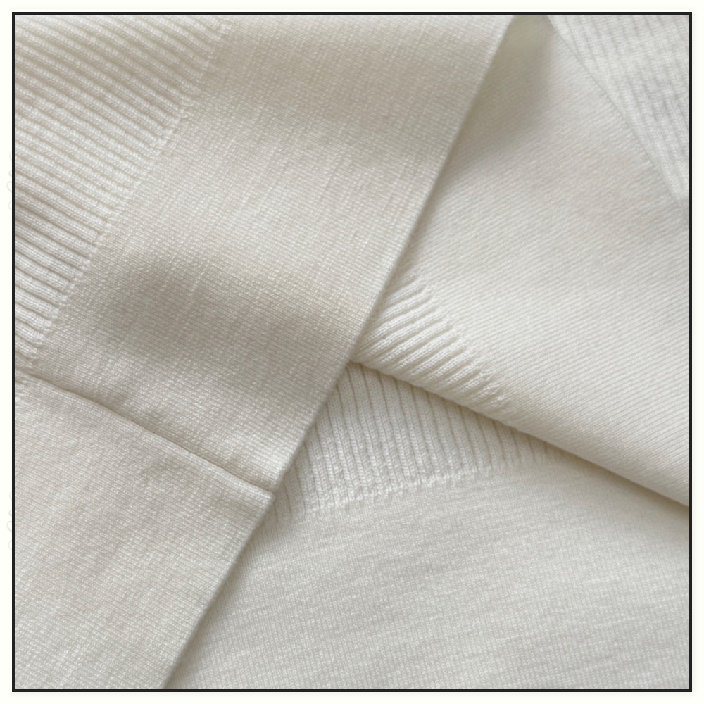 BOW DETAIL WOOL TURTLENECK