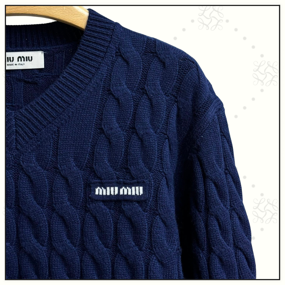 WOOL CABLE KNIT SWEATER