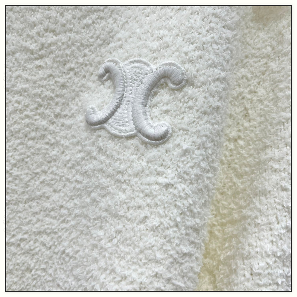 WOOL HALF ZIP SWEATER