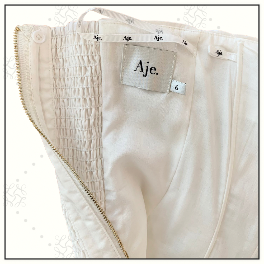 VIOLETTE BUBBLE HEM MINI DRESS