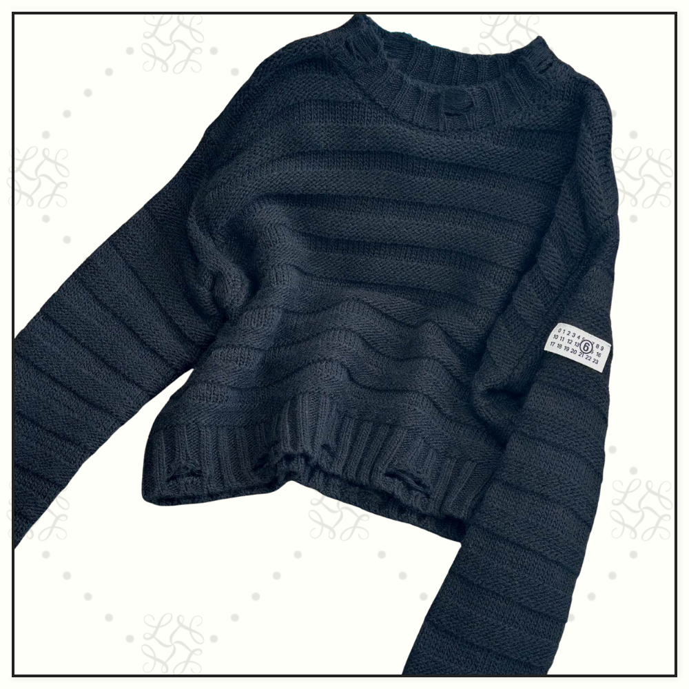 DISTRESSED WOOL SWEATER