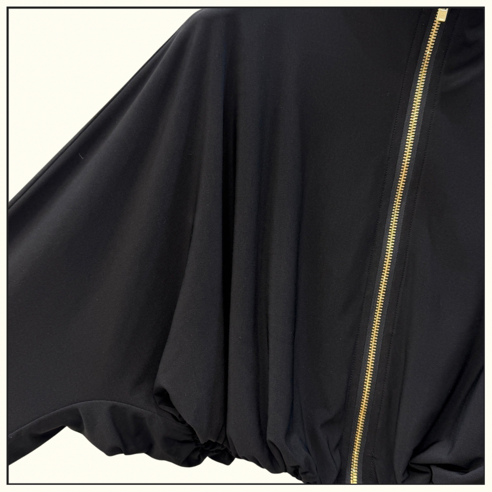 DRAPED JERSEY JACKET & TWISTED FLUID JERSEY SKIRT