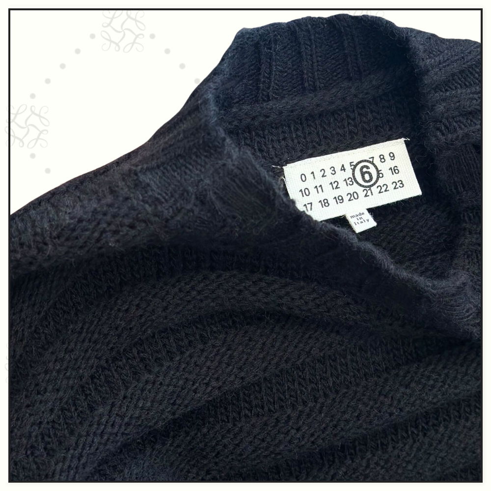 DISTRESSED WOOL SWEATER