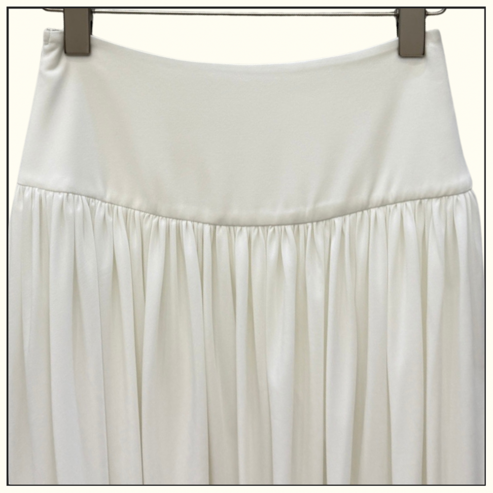 DRAPED JERSEY JACKET & TWISTED FLUID JERSEY SKIRT