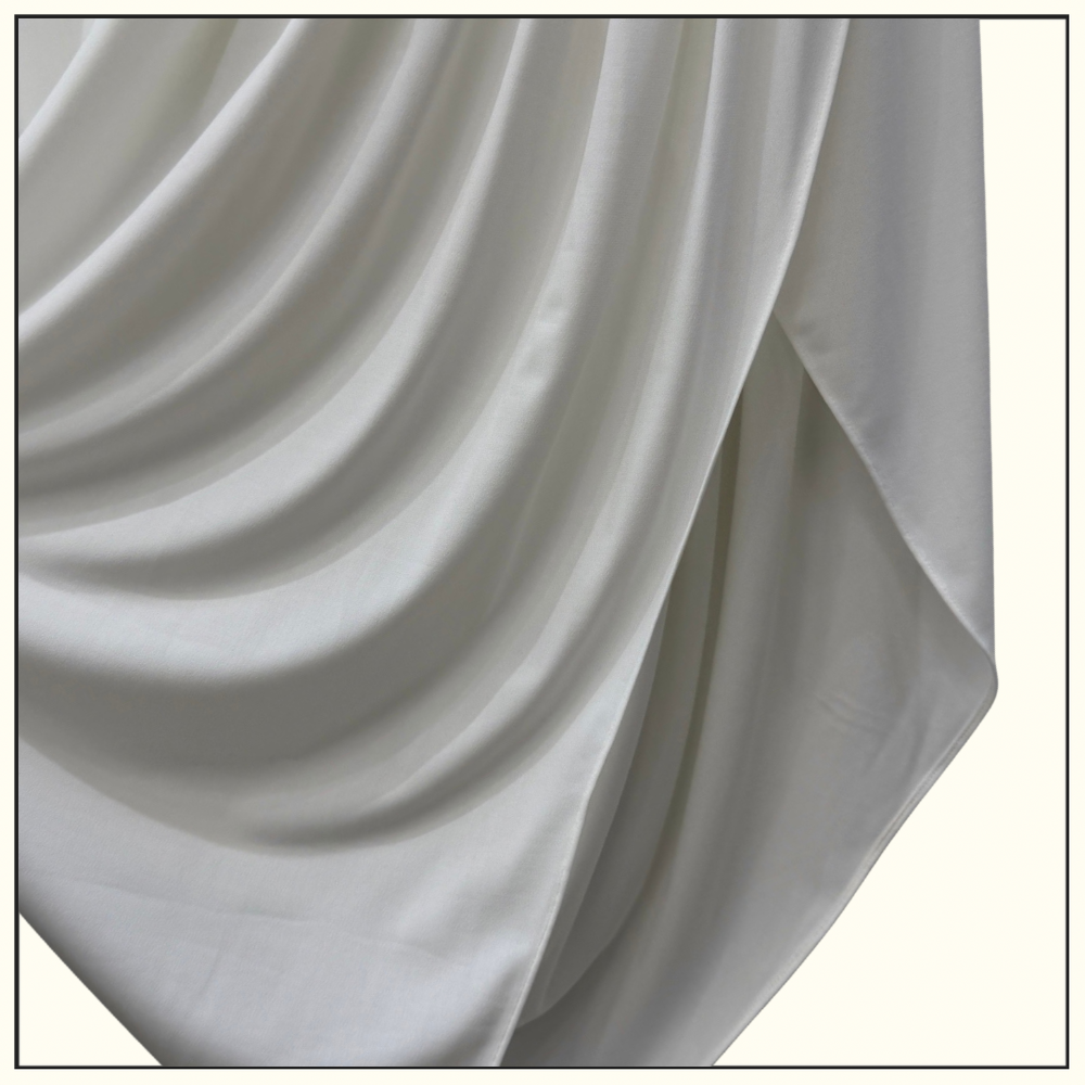 DRAPED JERSEY JACKET & TWISTED FLUID JERSEY SKIRT