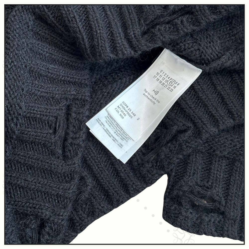 DISTRESSED WOOL SWEATER