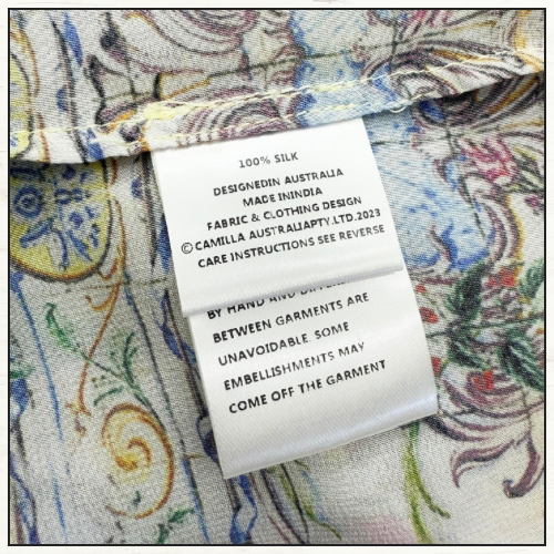 WAISTED DRESS WITH HEM RUFFLE