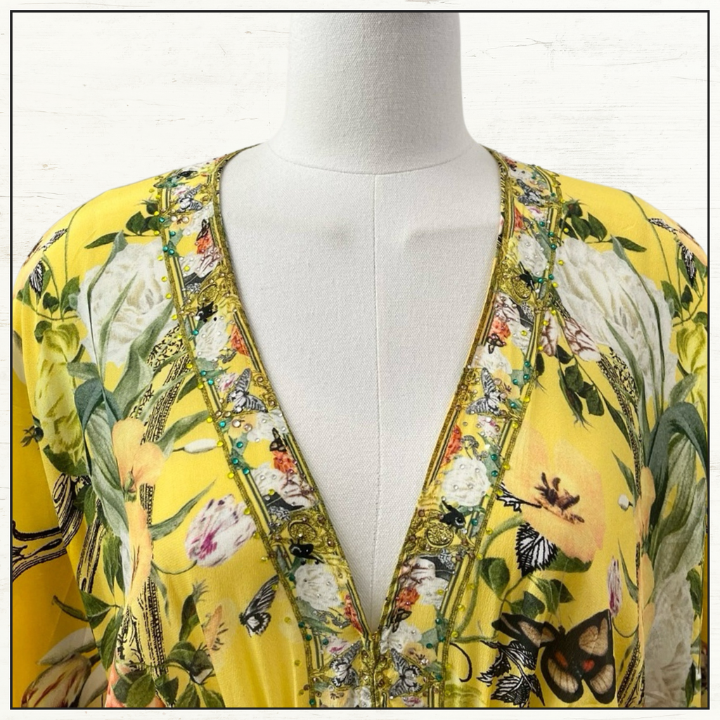 WAISTED DRESS WITH HEM RUFFLE