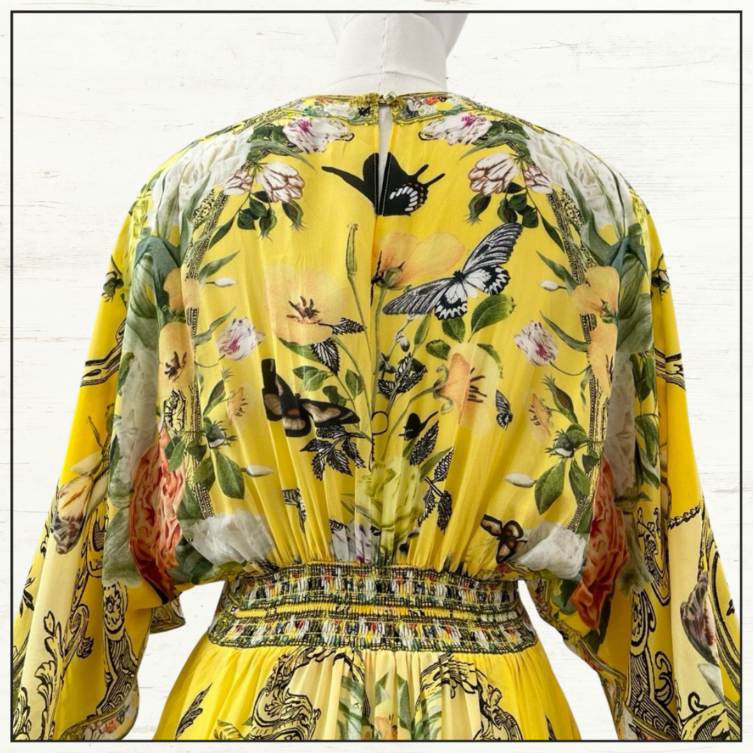 WAISTED DRESS WITH HEM RUFFLE