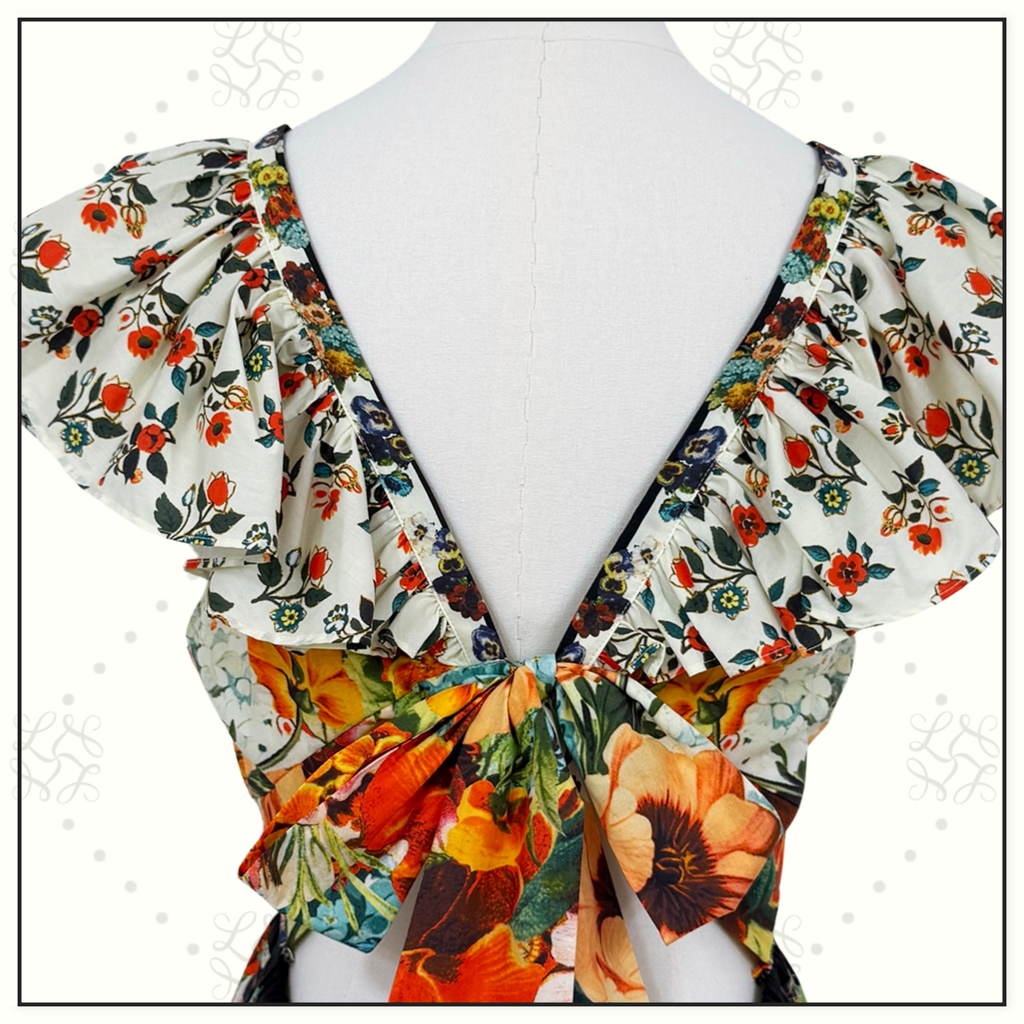 TIERED DRESS WITH NECK FRILL