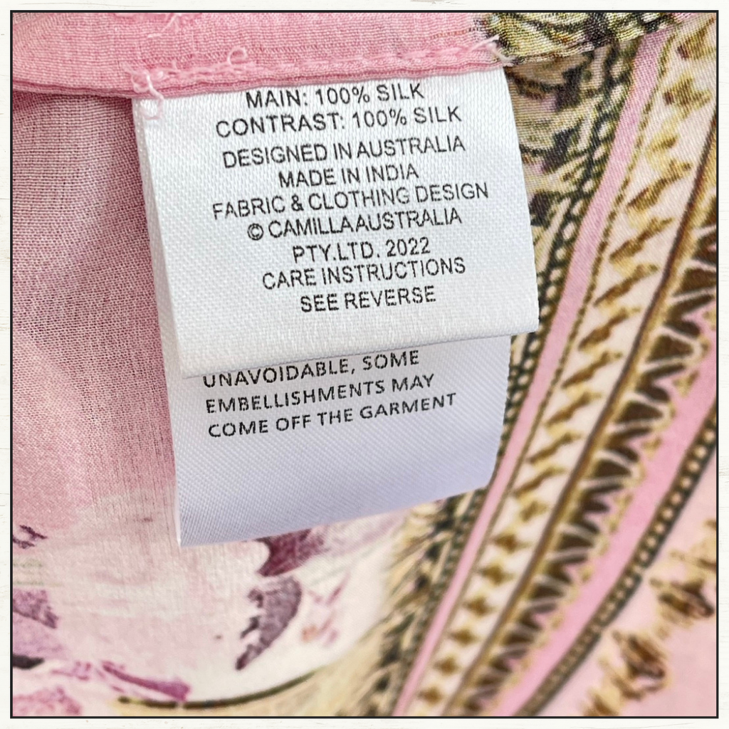 WAISTED DRESS WITH HEM RUFFLE