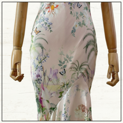 BIAS HALTER DRESS WITH RUFFLE HEM