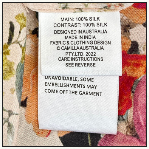 WAISTED DRESS WITH HEM RUFFLE