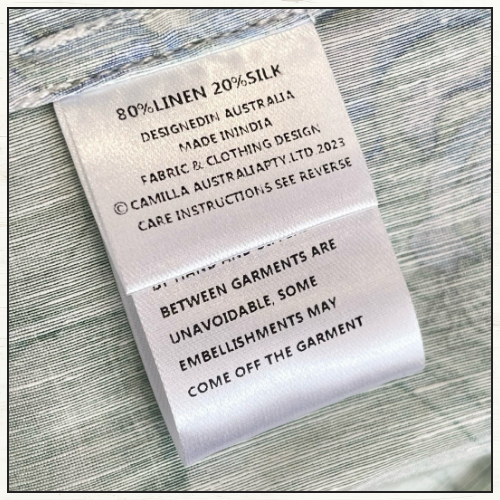 CUT OUT BODICE DRESS WITH TIERED SKIRT