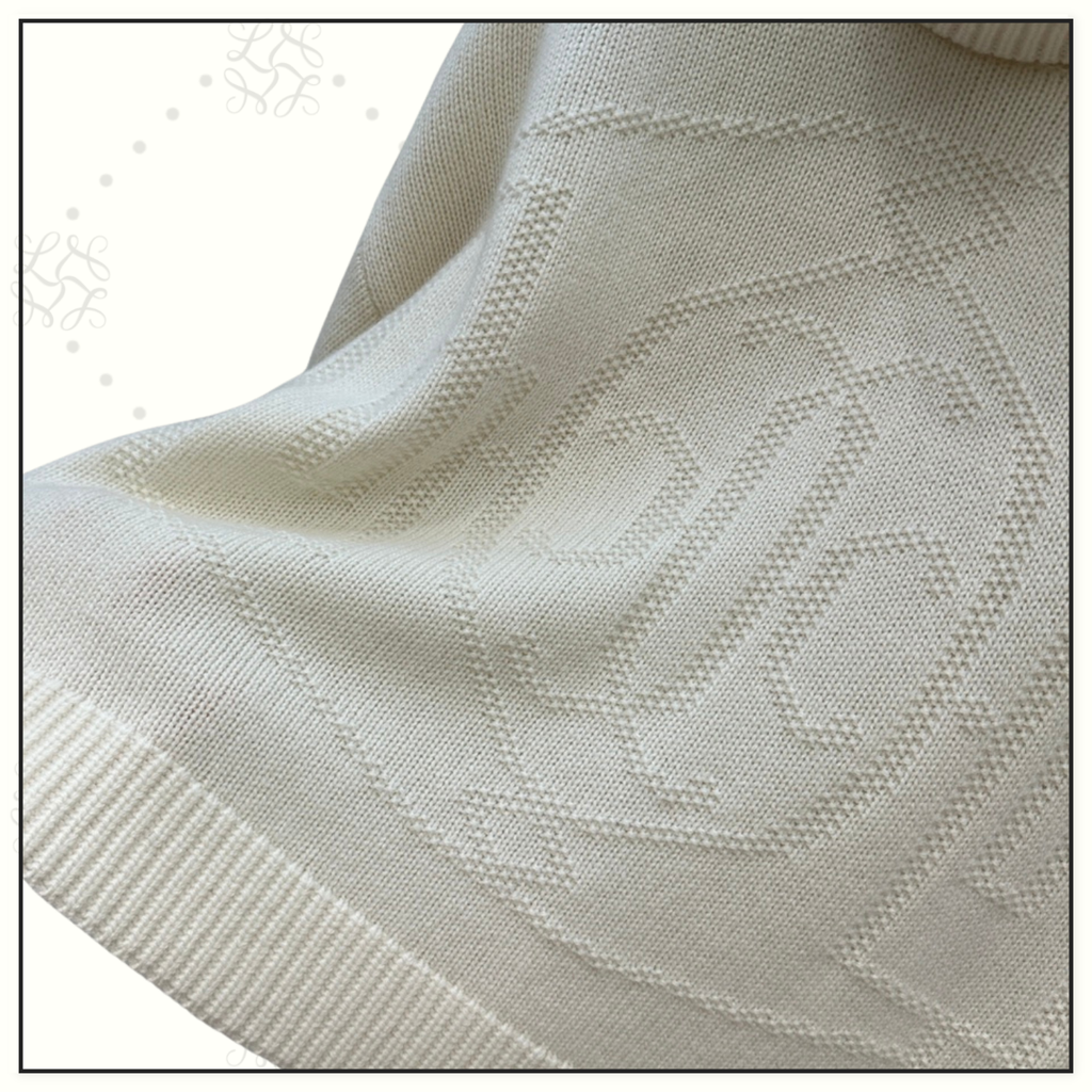 CASHMERE H LIFT SWEATER