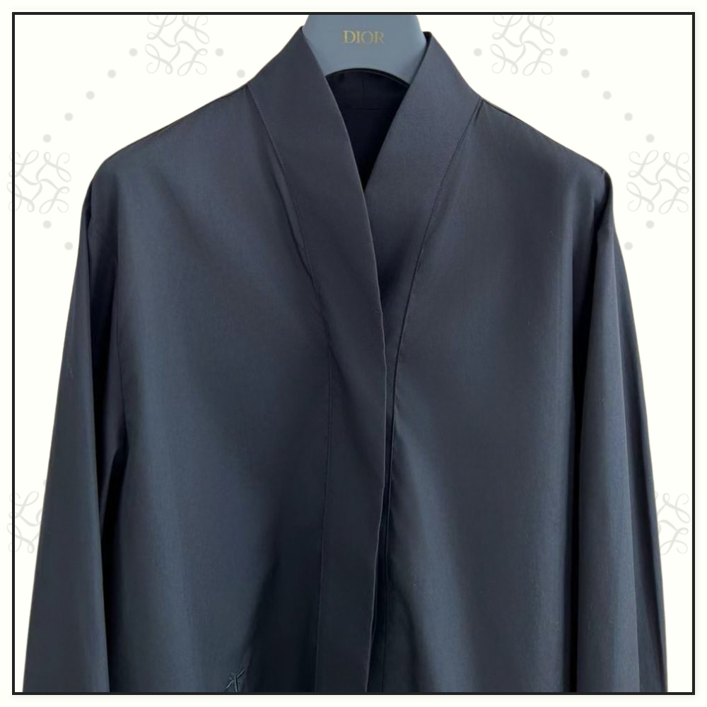 BLOUSE WITH OBLIQUE CLOSURE