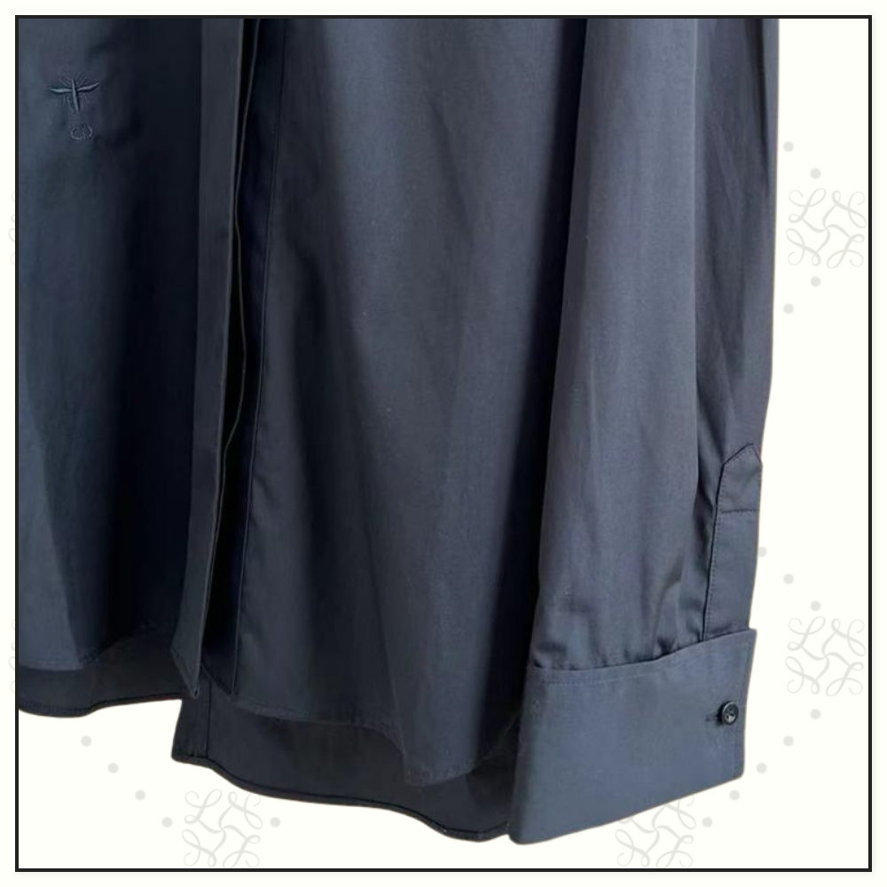 BLOUSE WITH OBLIQUE CLOSURE