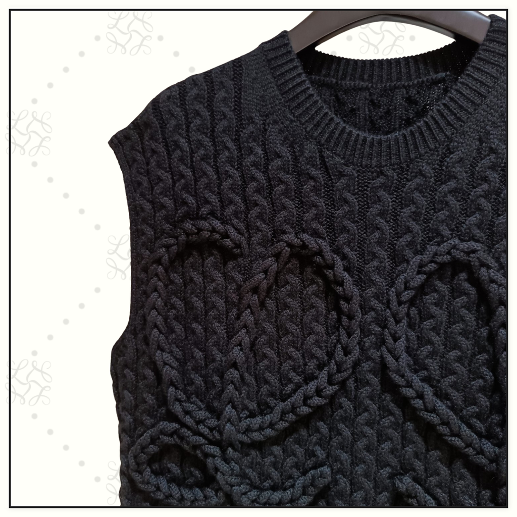 CABLE KNIT WOOL VEST