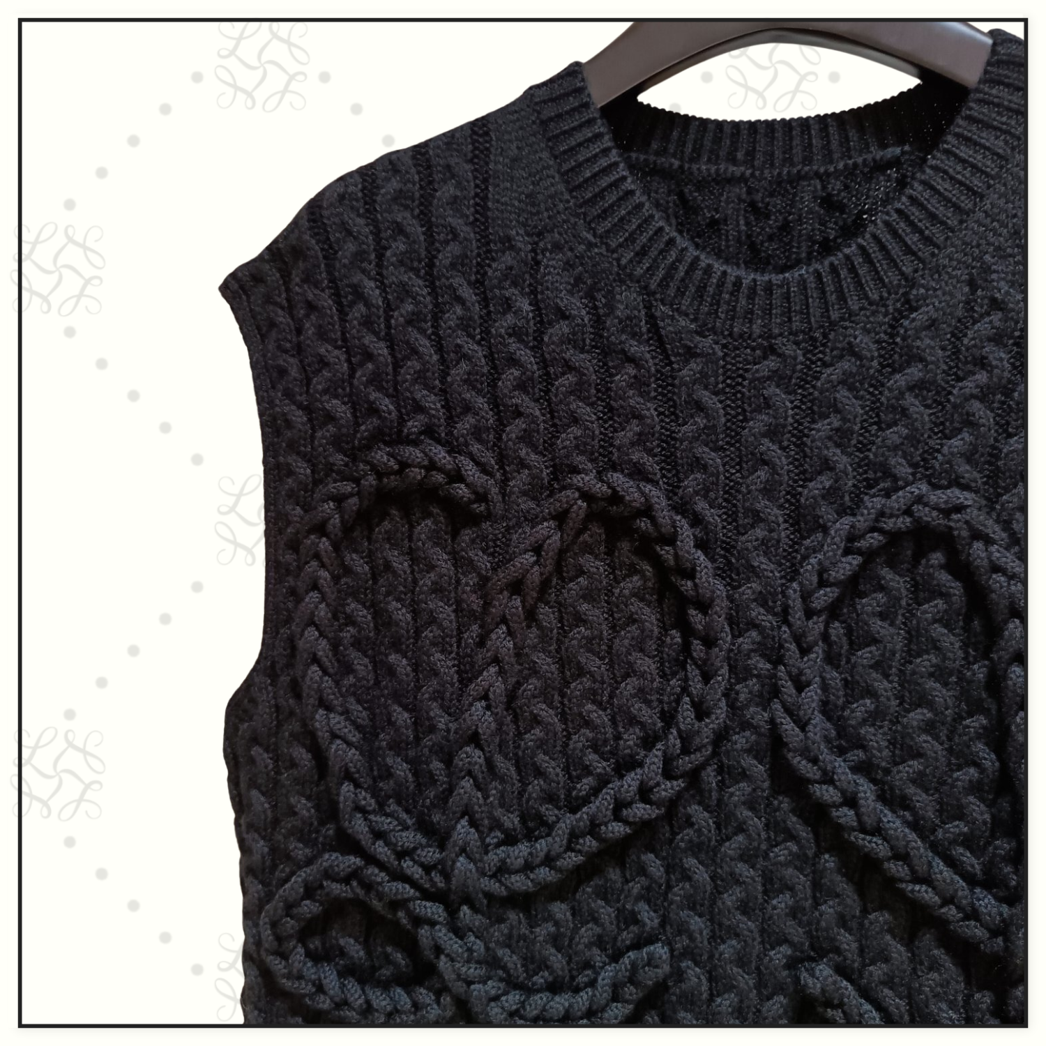 CABLE KNIT WOOL VEST
