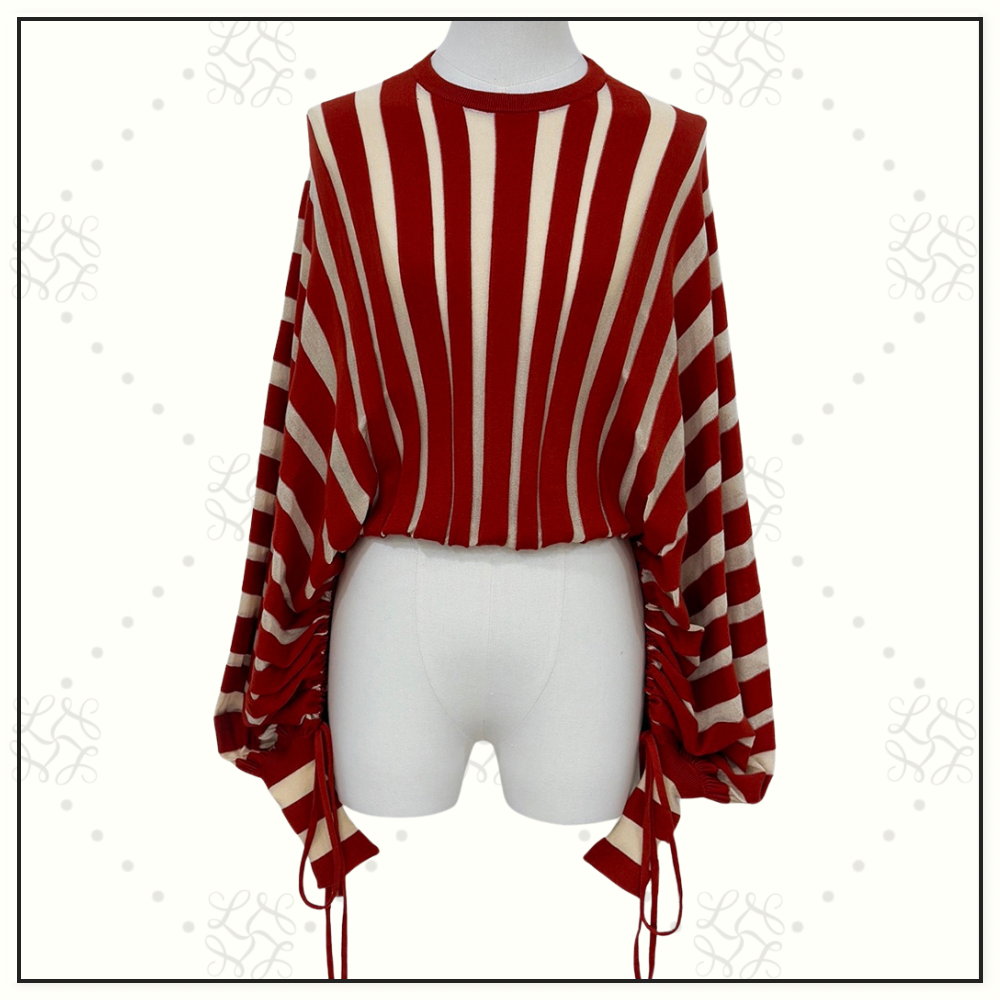 REBELLION DRAWN SWEATER