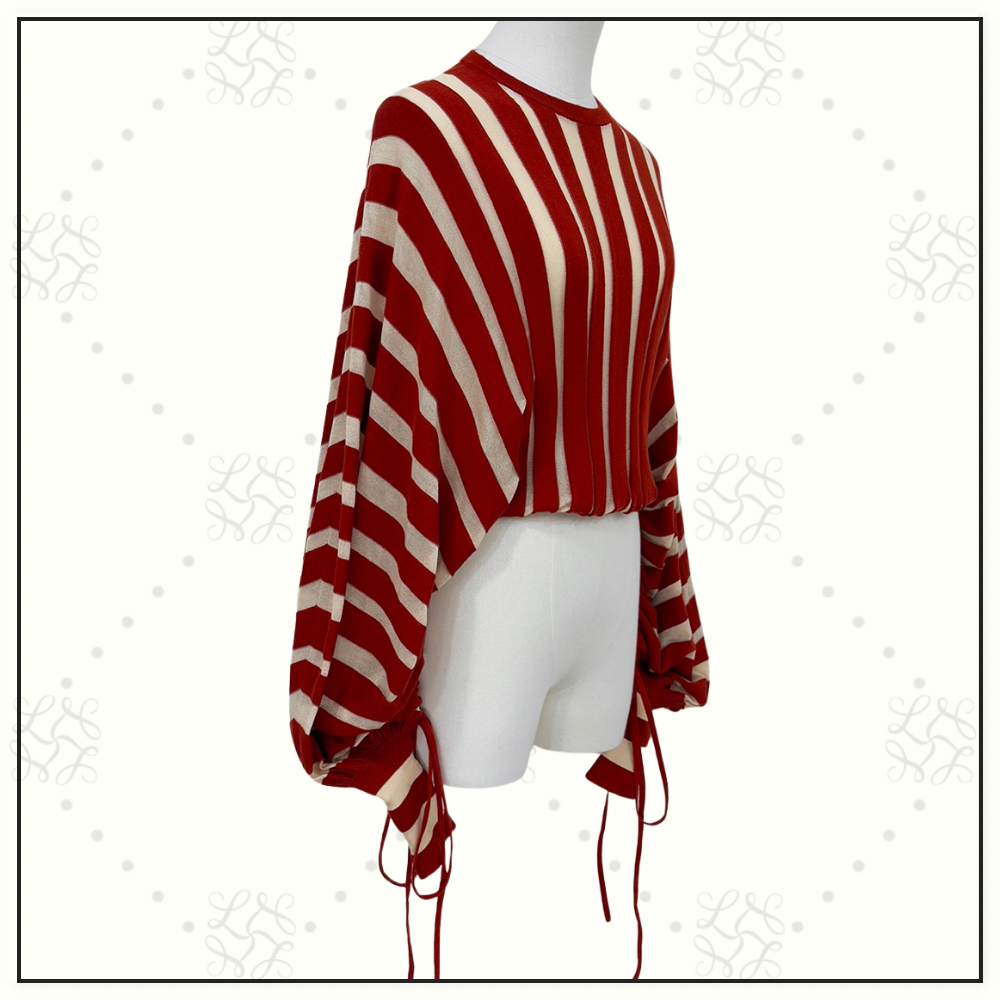 REBELLION DRAWN SWEATER