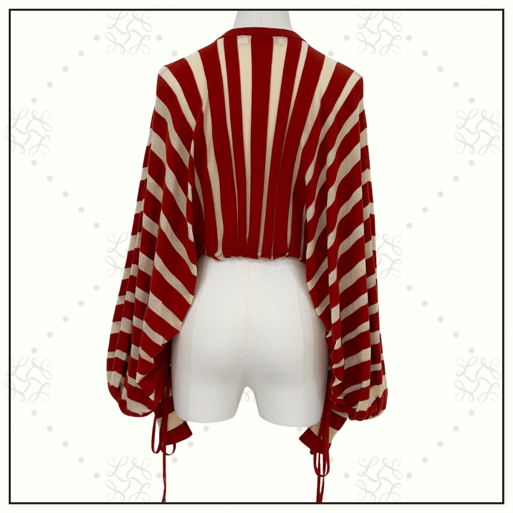 REBELLION DRAWN SWEATER