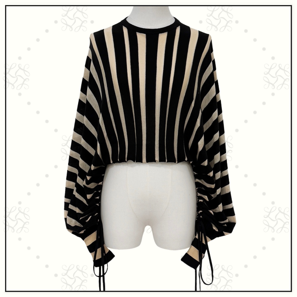 REBELLION DRAWN SWEATER