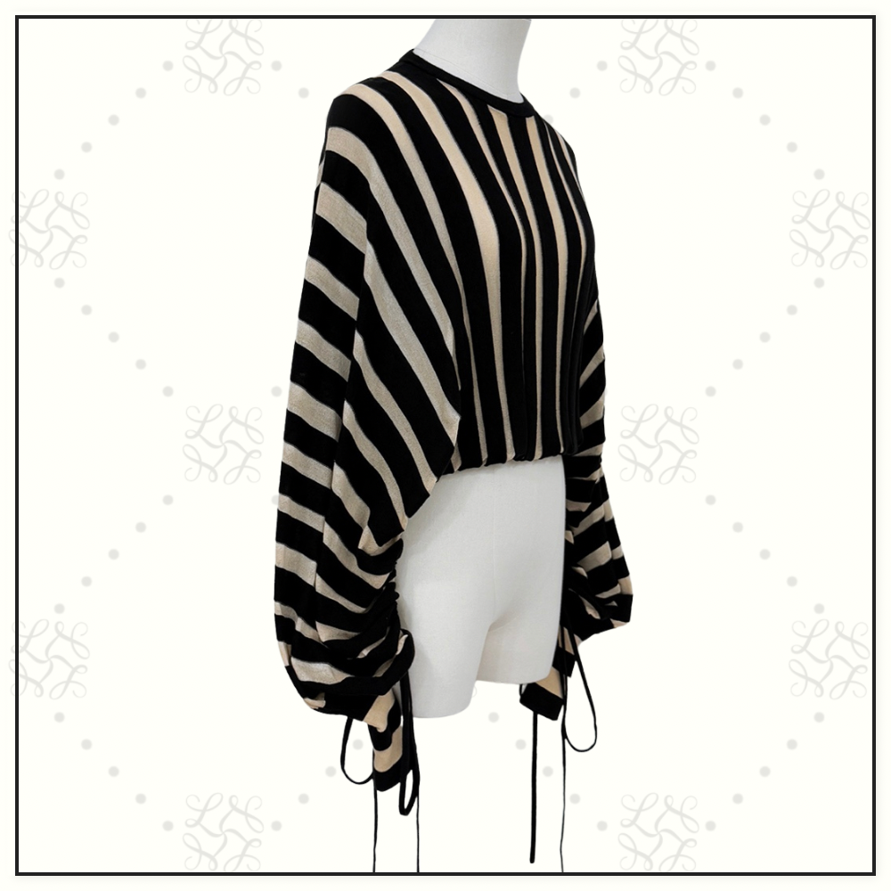 REBELLION DRAWN SWEATER