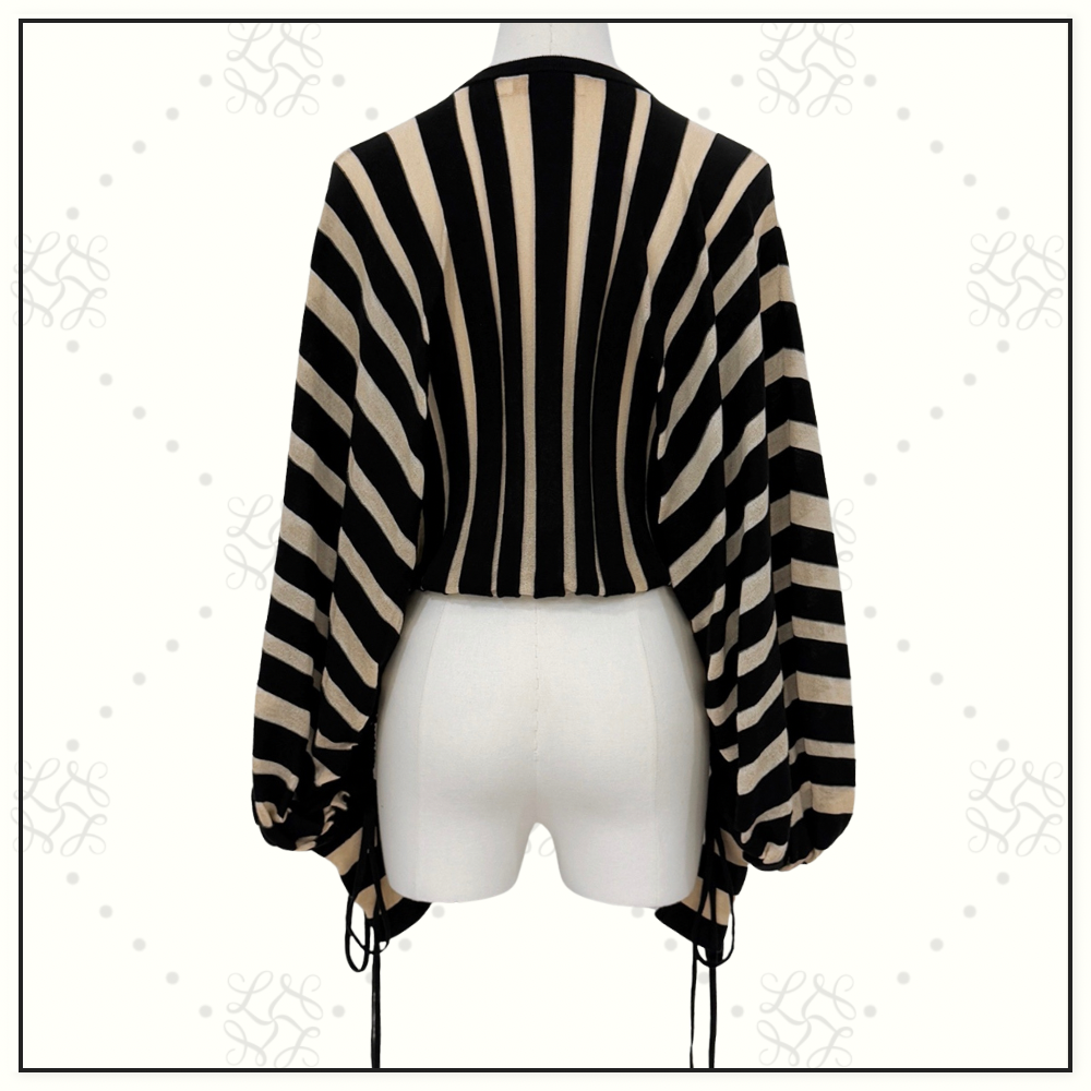 REBELLION DRAWN SWEATER