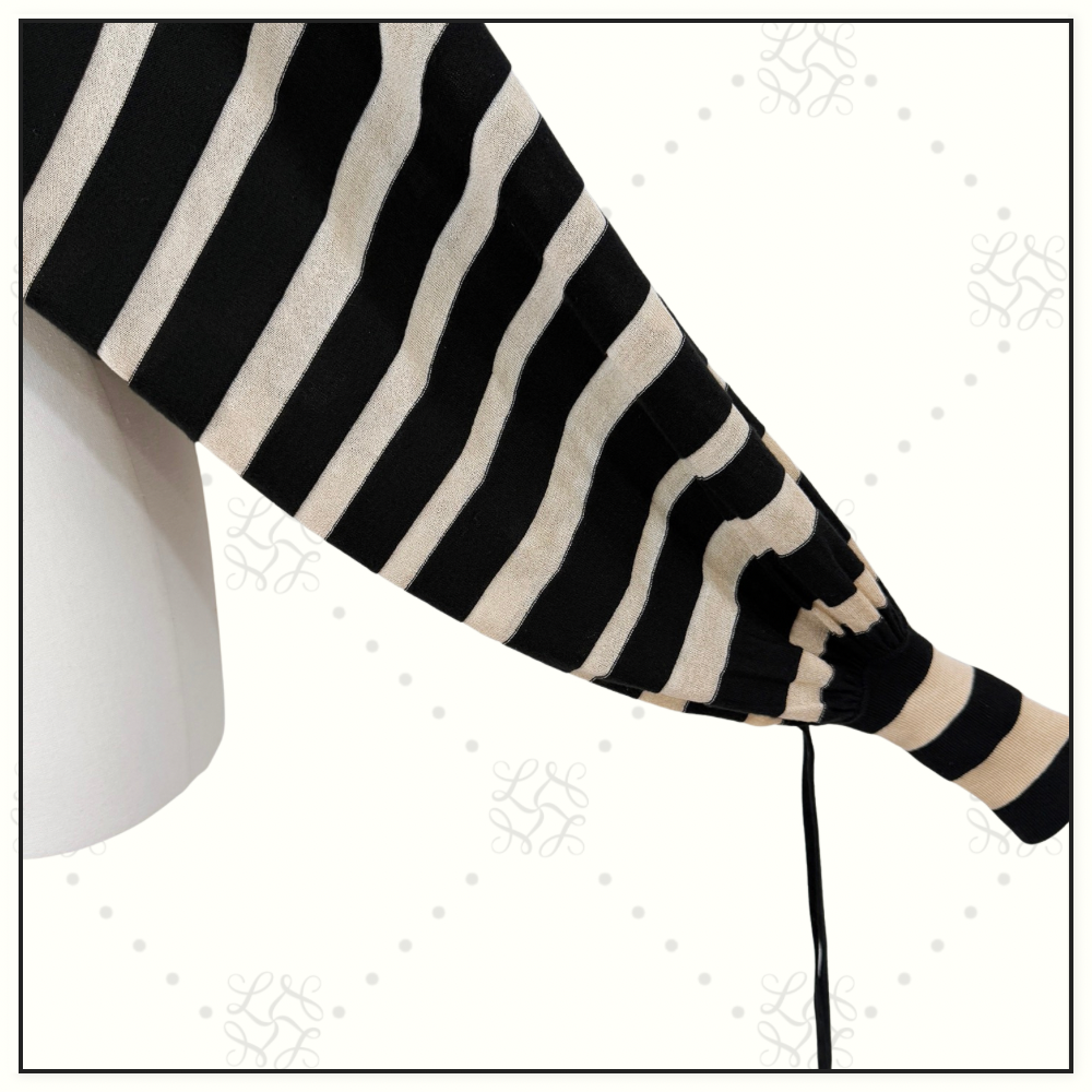 REBELLION DRAWN SWEATER