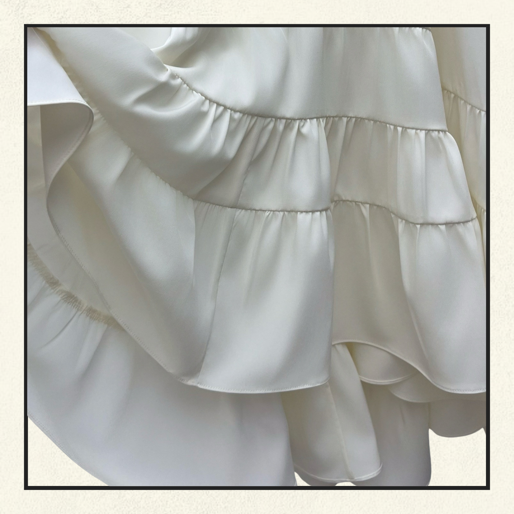 RUFFLED STRAPLESS SILK GOWN