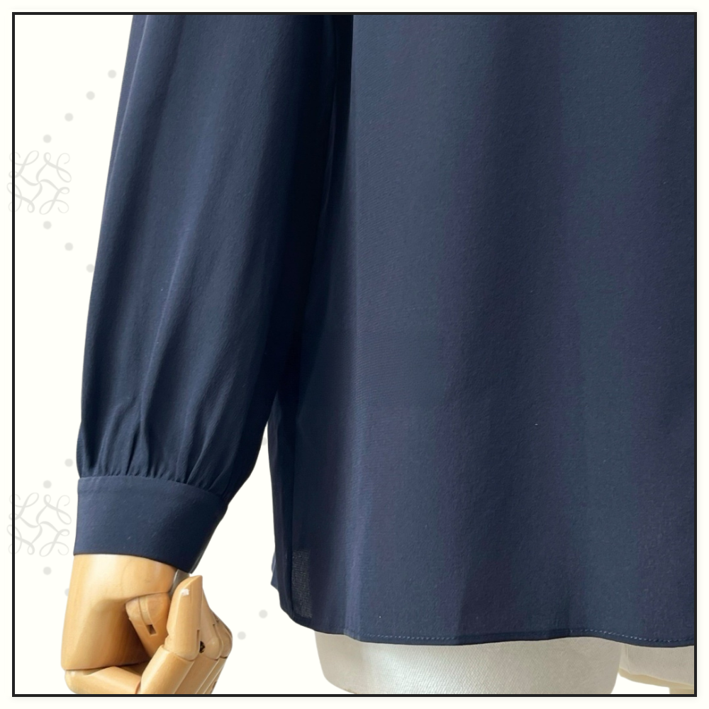 RUFFLED SILK CREPE BLOUSE