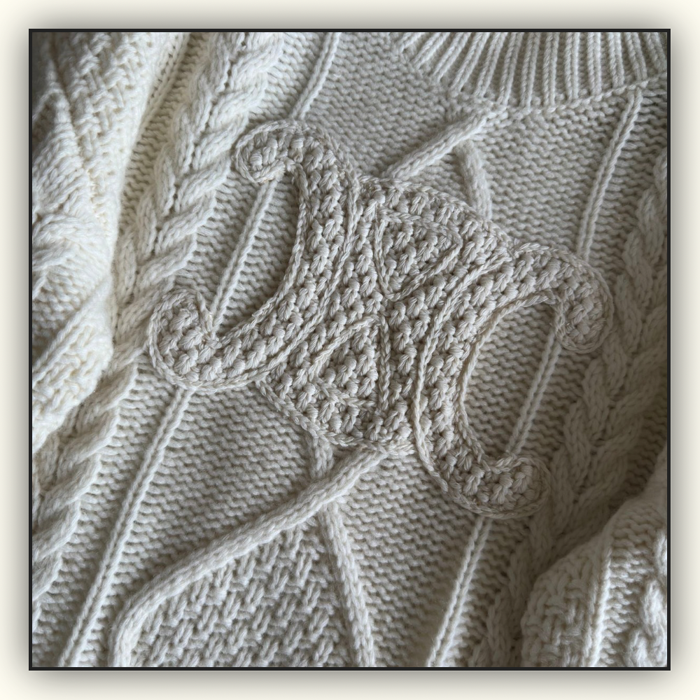 WOOL CABLE KNIT TURTLENECK